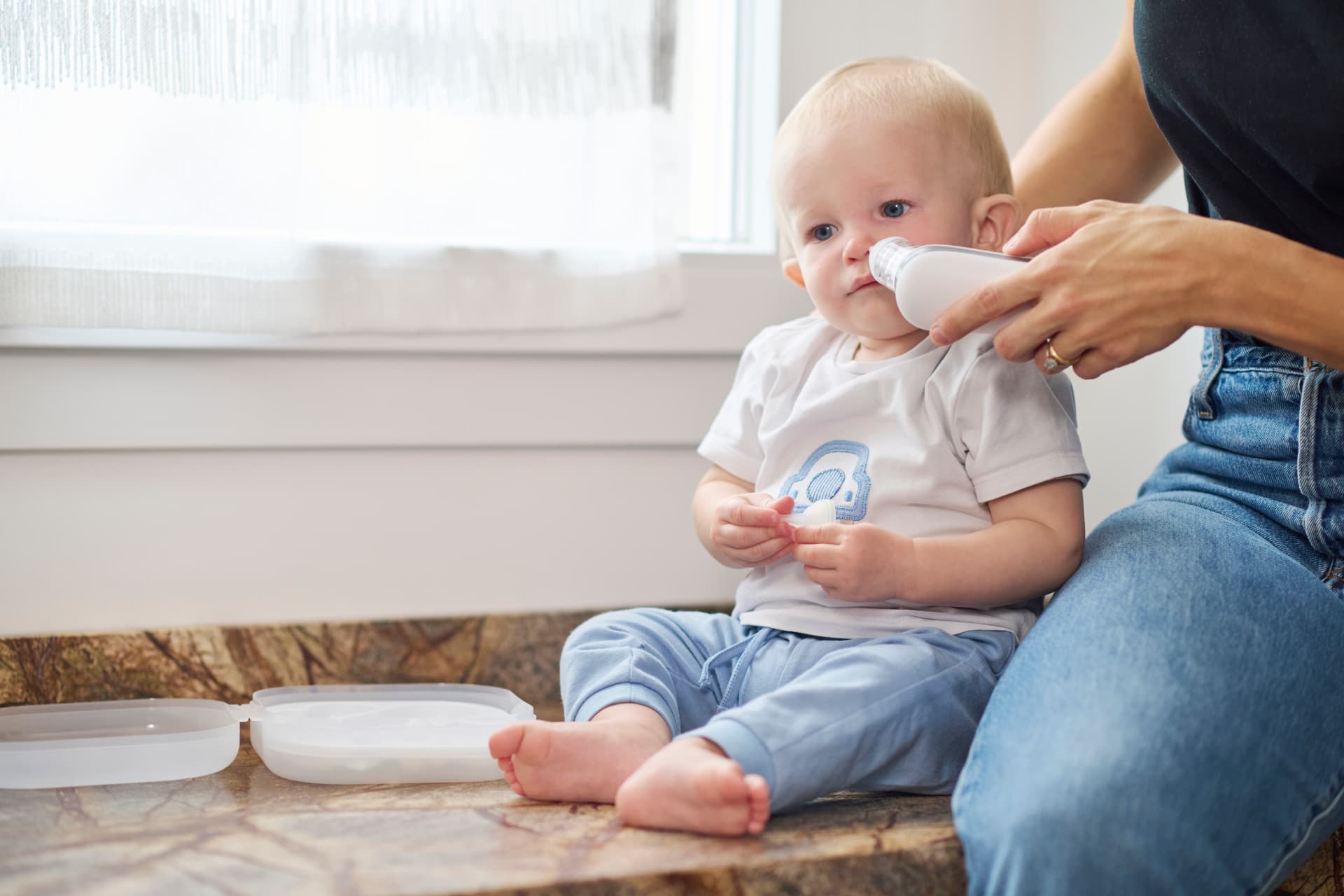 Enfant pendant l’aspiration nasale